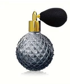Grey glass spray perfume bottle